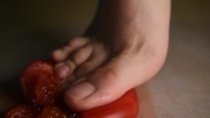 Girl Crushing Tomatoes with her Bare Feet