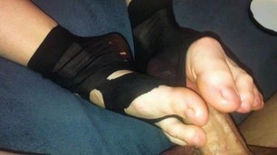 Amateur Footjob #44 Ripped Black Nylon Socks Ballbusting with Hot Cumshot