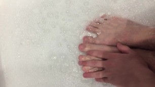 Solo Teens Feet being Washed in Hot Soapy Water